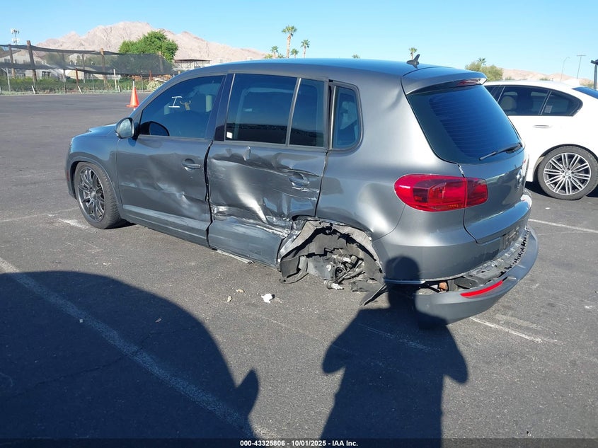 2014 VOLKSWAGEN TIGUAN S WVGAV3AX7EW618824