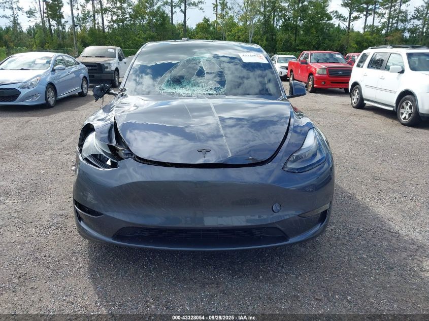 2023 Tesla Model Y Awd/Long Range Dual Motor All-Wheel Drive VIN: 7SAYGDEE6PF750494 Lot: 43328054