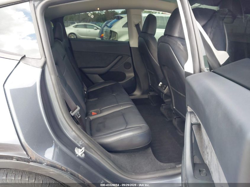 2023 Tesla Model Y Awd/Long Range Dual Motor All-Wheel Drive VIN: 7SAYGDEE6PF750494 Lot: 43328054