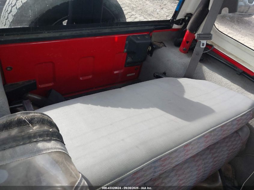 1998 Jeep Wrangler Sport VIN: 1J4FY19S4WP800064 Lot: 43328624