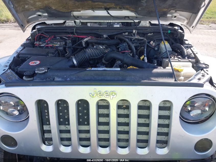 2007 Jeep Wrangler Sahara VIN: 1J8FA54167L209011 Lot: 43329250