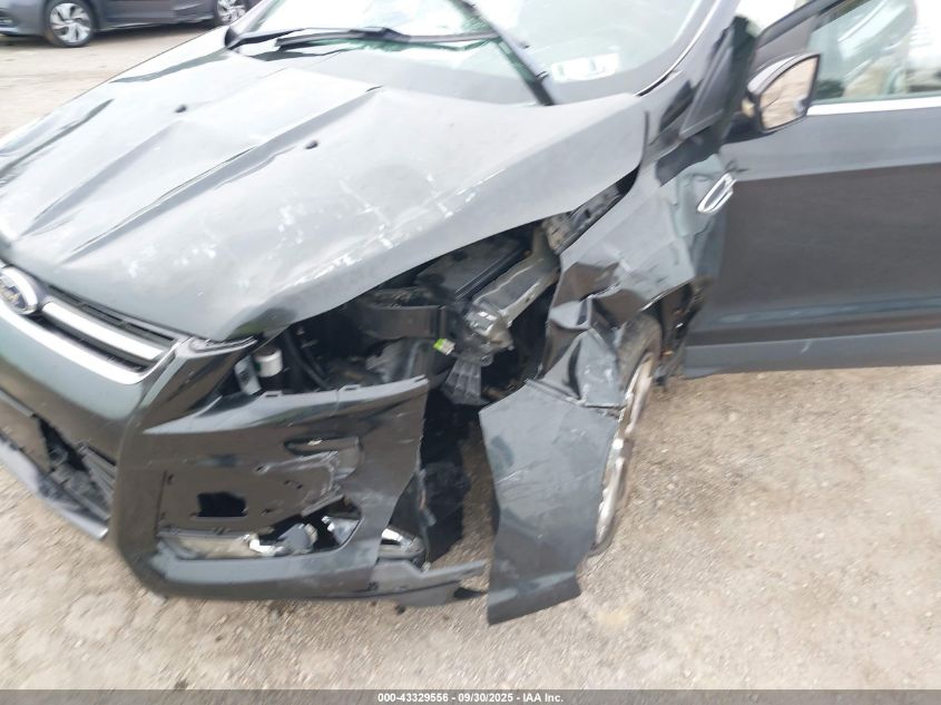 2014 Ford Escape Titanium VIN: 1FMCU0J94EUB66211 Lot: 43329556