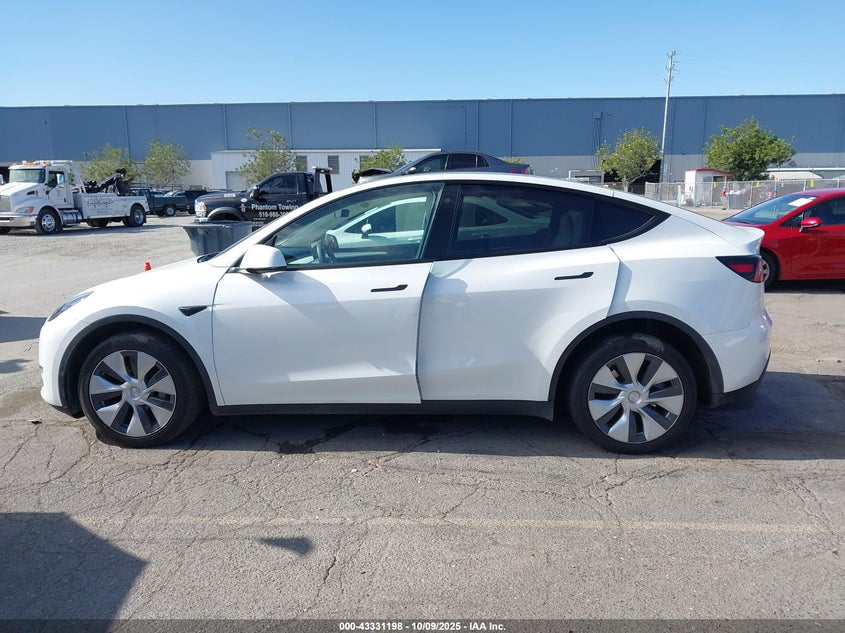 2023 Tesla Model Y Awd/Long Range Dual Motor All-Wheel Drive VIN: 7SAYGDEEXPF675234 Lot: 43331198