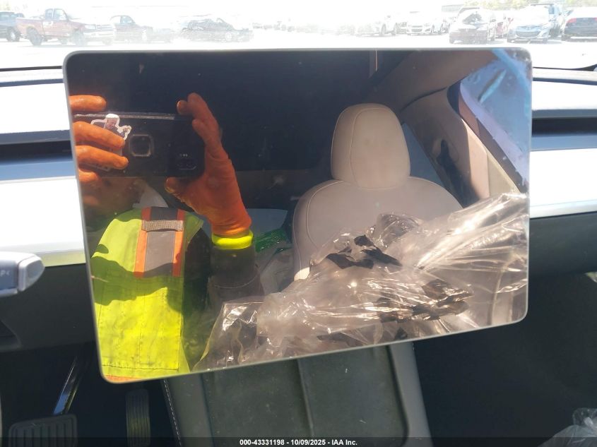 2023 Tesla Model Y Awd/Long Range Dual Motor All-Wheel Drive VIN: 7SAYGDEEXPF675234 Lot: 43331198