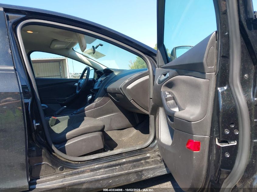 2015 Ford Focus Se VIN: 1FADP3F23FL287242 Lot: 43334086