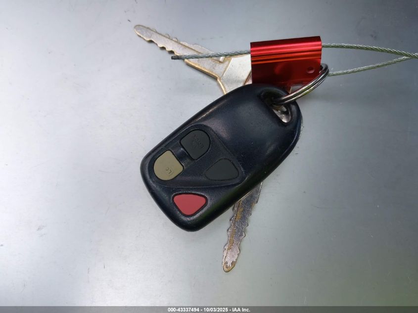 1999 Mazda Protege Es VIN: JM1BJ2218X0194066 Lot: 43337494