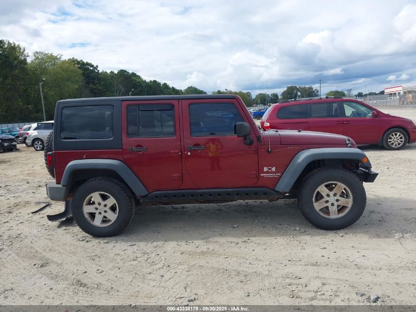 2009 Jeep Wrangler Unlimited X VIN: 1J4GA39179L786698 Lot: 43338179