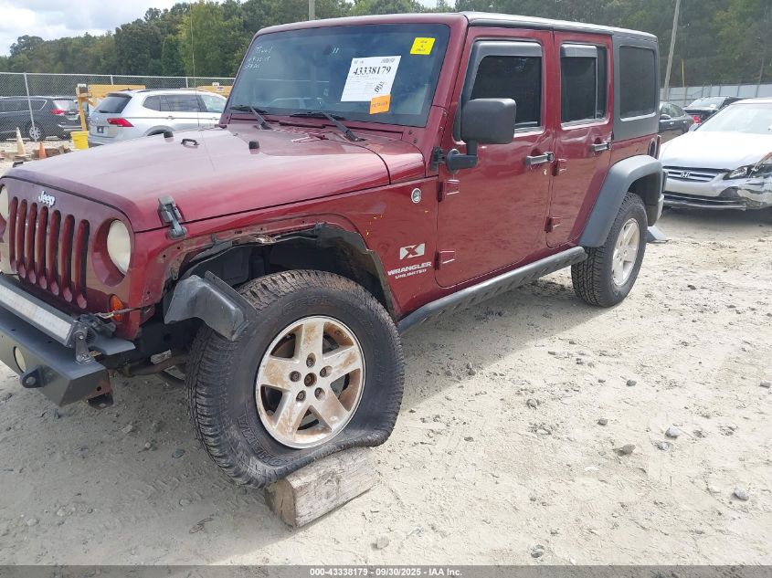 2009 Jeep Wrangler Unlimited X VIN: 1J4GA39179L786698 Lot: 43338179