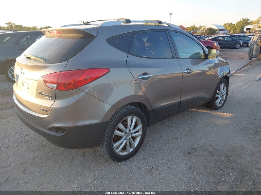 KM8JUCAC4DU621111 2013 HYUNDAI TUCSON photo no. 4