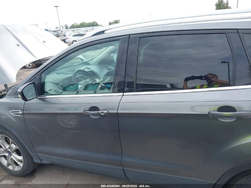 2014 Ford Escape Titanium VIN: 1FMCU9JXXEUC83634 Lot: 43340364