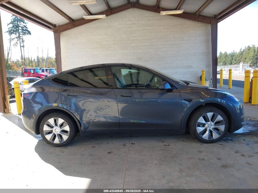 2023 Tesla Model Y Awd/Long Range Dual Motor All-Wheel Drive VIN: 7SAYGDEE6PF886642 Lot: 43340545