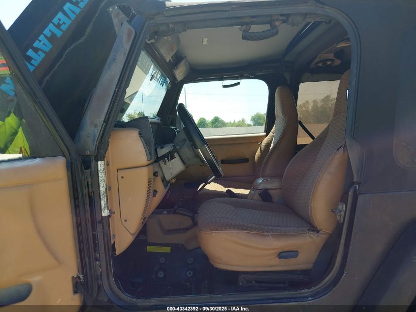 1998 Jeep Wrangler Sport VIN: 1J4FY19S8WP745716 Lot: 43342392