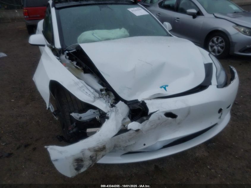 2022 Tesla Model 3 Long Range Dual Motor All-Wheel Drive VIN: 5YJ3E1EB0NF260051 Lot: 43344355