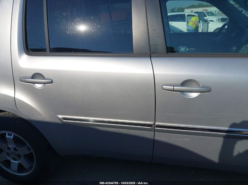 2011 Honda Pilot Touring VIN: 5FNYF4H93BB027712 Lot: 43344709