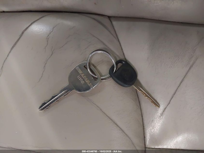 2004 Chevrolet Tahoe Lt VIN: 1GNEK13Z74J180441 Lot: 43346760