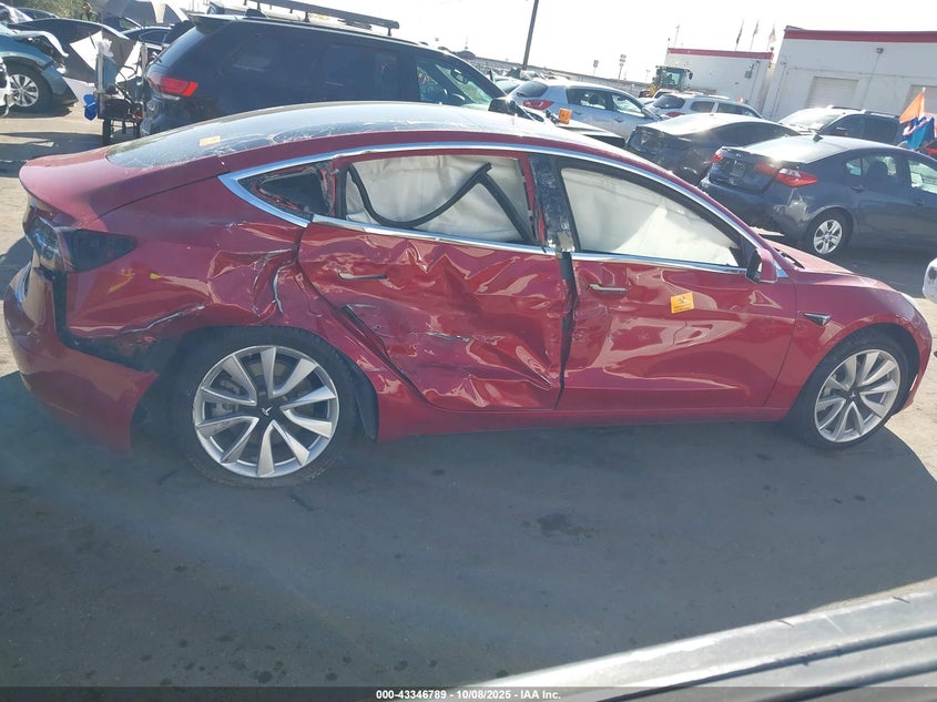 2018 Tesla Model 3 Long Range/Performance VIN: 5YJ3E1EB1JF117278 Lot: 43346789