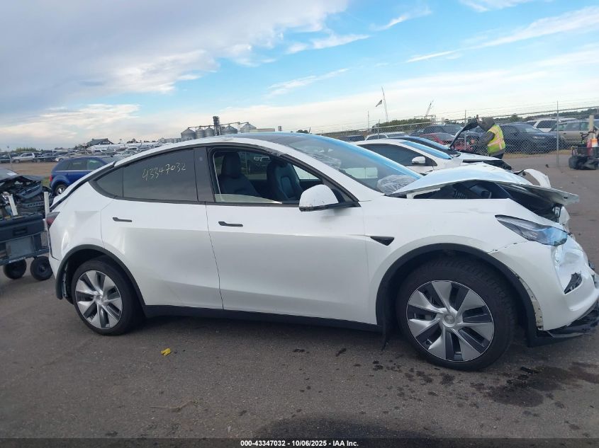 2023 Tesla Model Y Awd/Long Range Dual Motor All-Wheel Drive VIN: 7SAYGDEE6PA058717 Lot: 43347032