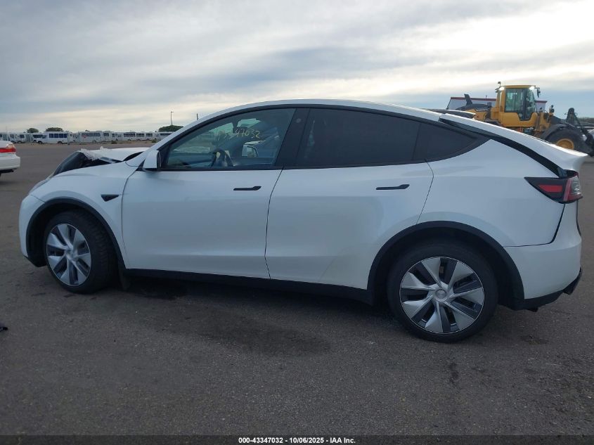 2023 Tesla Model Y Awd/Long Range Dual Motor All-Wheel Drive VIN: 7SAYGDEE6PA058717 Lot: 43347032