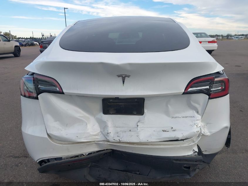 2023 Tesla Model Y Awd/Long Range Dual Motor All-Wheel Drive VIN: 7SAYGDEE6PA058717 Lot: 43347032