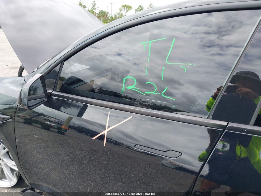 2023 Tesla Model Y Awd/Long Range Dual Motor All-Wheel Drive VIN: 7SAYGDEE7PF768213 Lot: 43347774