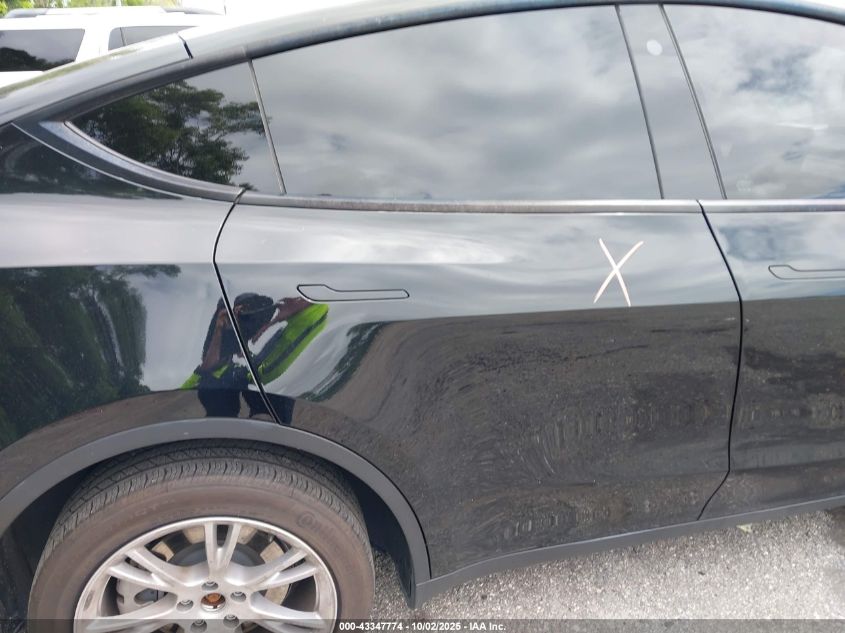 2023 Tesla Model Y Awd/Long Range Dual Motor All-Wheel Drive VIN: 7SAYGDEE7PF768213 Lot: 43347774