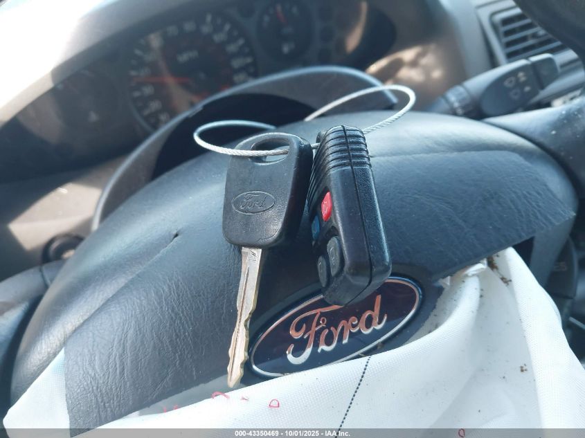 2005 Ford Focus Zx4 VIN: 1FAFP34N45W220667 Lot: 43350469