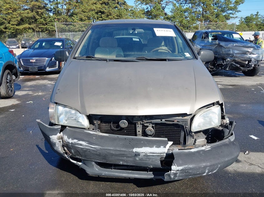 1999 Toyota Sienna Ce VIN: 4T3GF19C2XU143697 Lot: 43351456