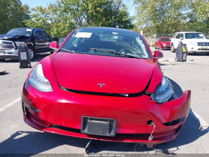 2018 Tesla Model 3 Long Range/Mid Range VIN: 5YJ3E1EA9JF034009 Lot: 43353025