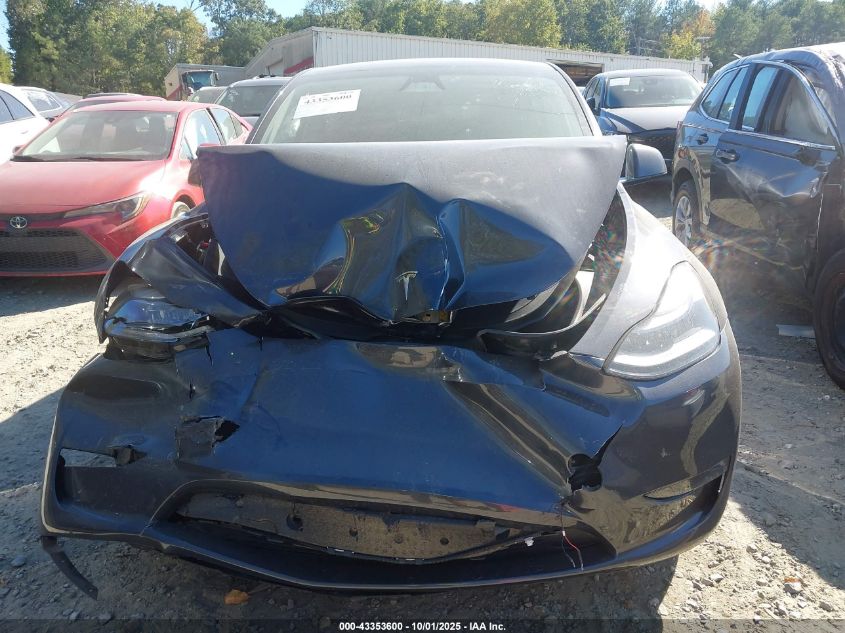 2025 Tesla Model Y Long Range Dual Motor All-Wheel Drive VIN: 7SAYGDEE0SA358164 Lot: 43353600