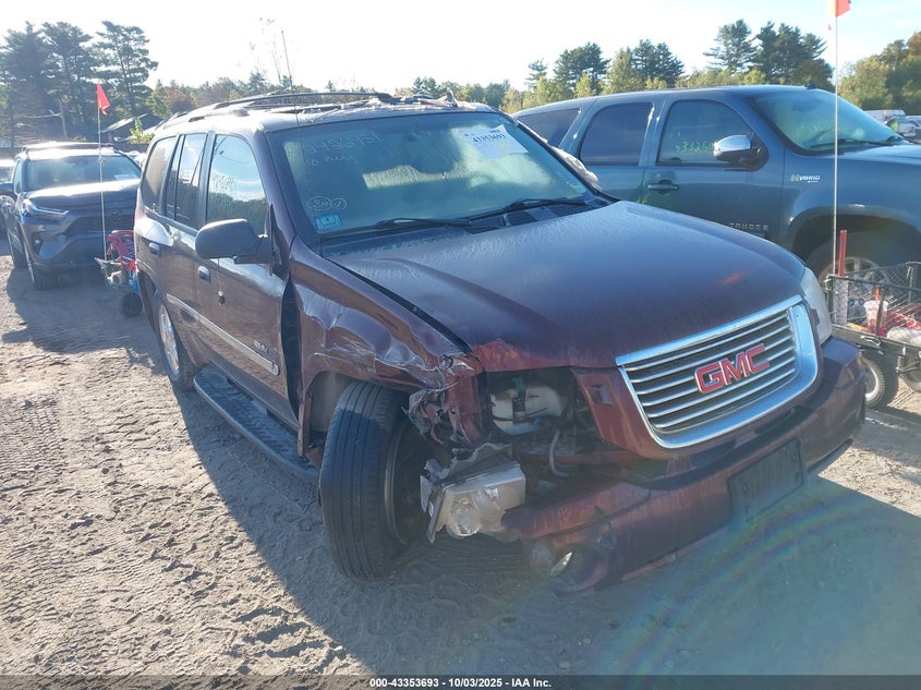2006 GMC Envoy Slt purple other gasoline 1GKDT13S862294356 photo #1