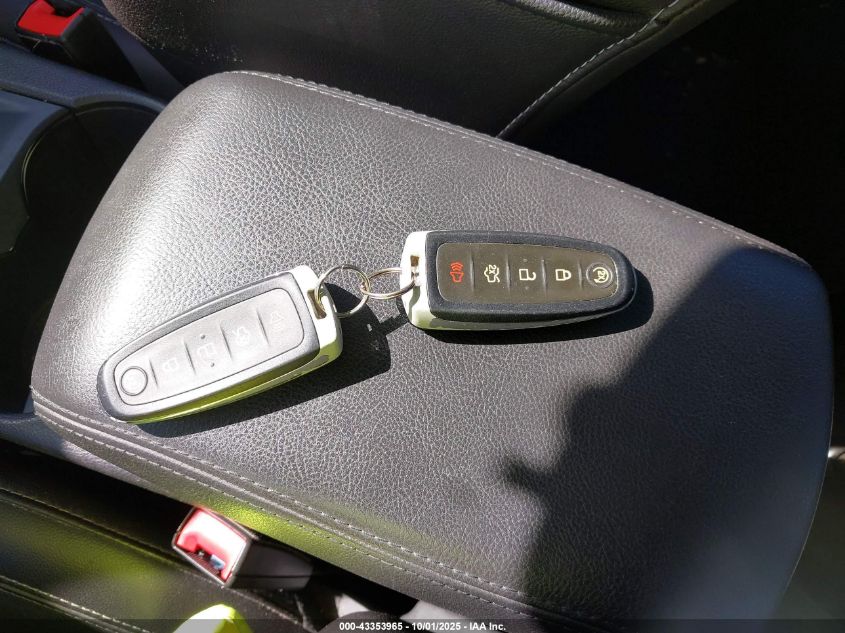 2014 Ford Focus Titanium VIN: 1FADP3J25EL280377 Lot: 43353965