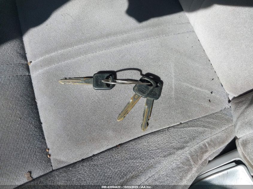 1996 Ford Taurus G VIN: 1FALP51U5TA263421 Lot: 43354420