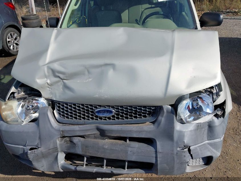 2003 Ford Escape Xls VIN: 1FMYU02103KE02120 Lot: 43354615