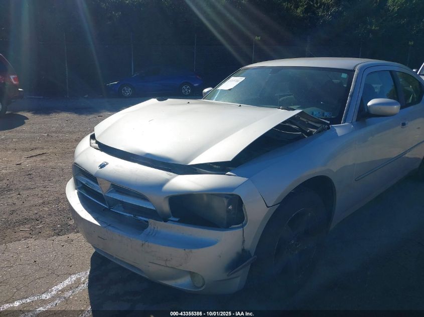 2009 Dodge Charger VIN: 2B3LA43V09H570504 Lot: 43355386