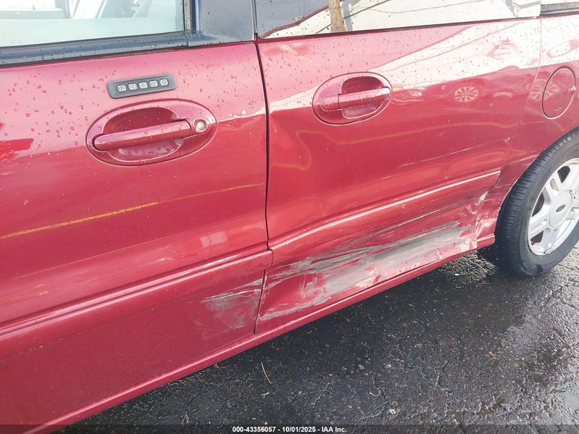 2005 Ford Freestar Sel VIN: 2FMZA52295BA61137 Lot: 43356057