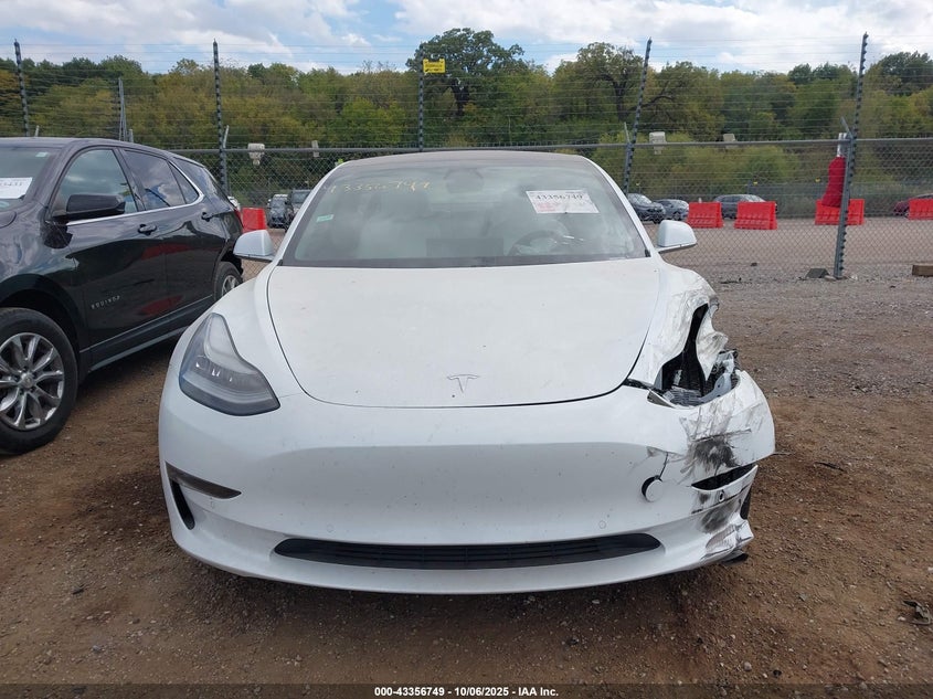 2018 Tesla Model 3 Long Range/Performance VIN: 5YJ3E1EB7JF098090 Lot: 43356749