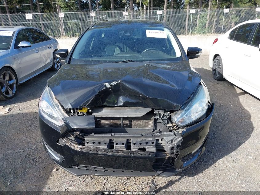 2016 Ford Focus Titanium VIN: 1FADP3N28GL369986 Lot: 43358118