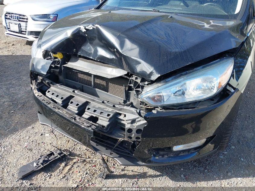 2016 Ford Focus Titanium VIN: 1FADP3N28GL369986 Lot: 43358118