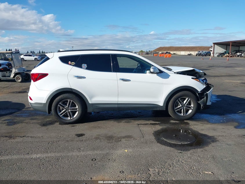 2018 Hyundai Santa Fe Sport 2.4L VIN: 5NMZUDLB1JH067028 Lot: 43358213