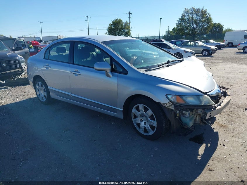 2009 Honda Civic Lx silver sedan gasoline 2HGFA16599H320203 photo #1
