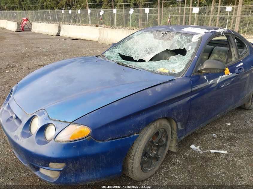 2000 Hyundai Tiburon Base Pkg 1, 2 5/Base Pkg 3 4 VIN: KMHJG25F3YU204798 Lot: 43359132