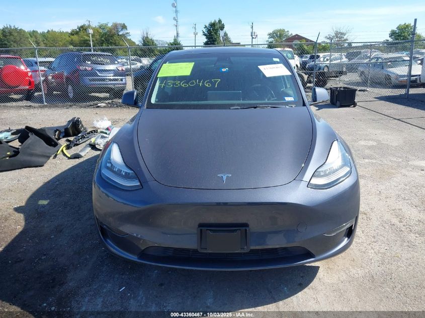 2023 Tesla Model Y Awd/Long Range Dual Motor All-Wheel Drive VIN: 7SAYGDEE0PA034686 Lot: 43360467