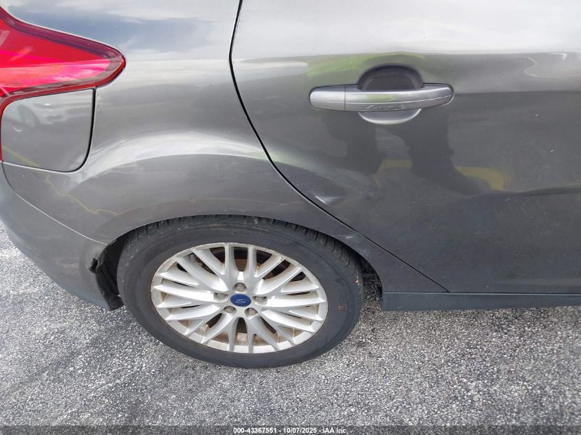 2014 Ford Focus Titanium VIN: 1FADP3N21EL340519 Lot: 43367551