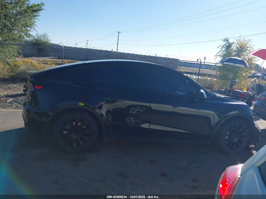 2023 Tesla Model Y Awd/Long Range Dual Motor All-Wheel Drive VIN: 7SAYGAEE1PF911557 Lot: 43369234