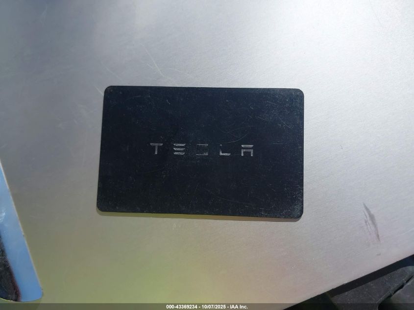 2023 Tesla Model Y Awd/Long Range Dual Motor All-Wheel Drive VIN: 7SAYGAEE1PF911557 Lot: 43369234