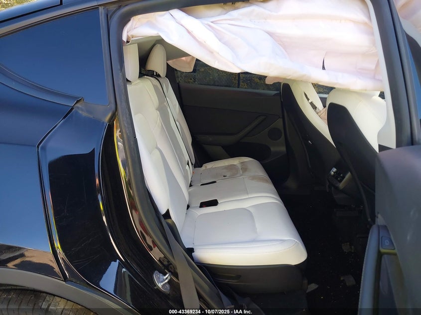 2023 Tesla Model Y Awd/Long Range Dual Motor All-Wheel Drive VIN: 7SAYGAEE1PF911557 Lot: 43369234