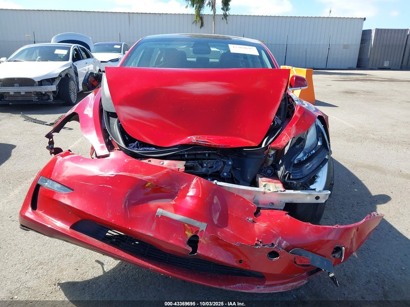 2018 Tesla Model 3 Long Range/Performance VIN: 5YJ3E1EB9JF129923 Lot: 43369695