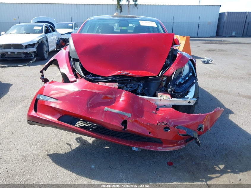 2018 Tesla Model 3 Long Range/Performance VIN: 5YJ3E1EB9JF129923 Lot: 43369695