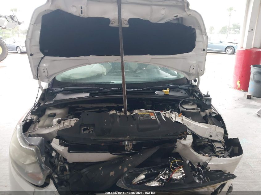 2014 Ford Focus Titanium VIN: 1FADP3J2XEL106711 Lot: 43371614