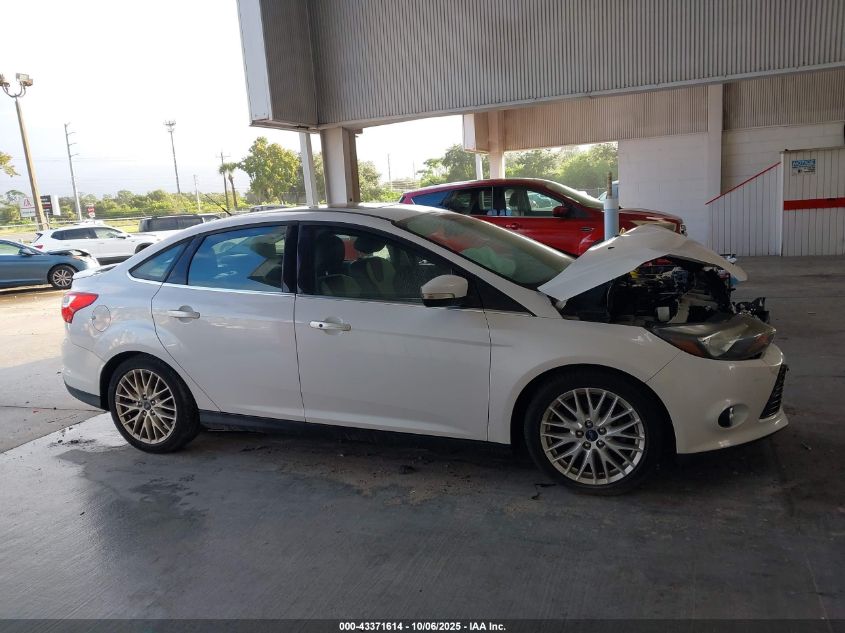 2014 Ford Focus Titanium VIN: 1FADP3J2XEL106711 Lot: 43371614